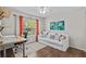 This office space has a full sized sofa, art, and good lighting making it comfortable and ready to work at 1077 Captains Way, Tarpon Springs, FL 34689