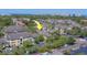 Overhead view of a multi-Gathering residential complex showcasing architecture, landscaping, and convenient parking at 1240 S Missouri Ave # 415, Clearwater, FL 33756