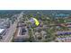 Overhead photograph of apartment community showing proximity to the lake and thoroughfare at 1240 S Missouri Ave # 415, Clearwater, FL 33756