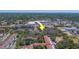 High angle view of an apartment complex surrounded by commercial real estate and greenery at 1240 S Missouri Ave # 415, Clearwater, FL 33756