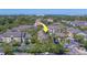 Aerial view of condo buildings with manicured lawns and landscaping at 1240 S Missouri Ave # 415, Clearwater, FL 33756