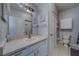 Clean bathroom with vanity, ample storage, and neutral color scheme at 1240 S Missouri Ave # 415, Clearwater, FL 33756