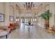 Spacious lobby with high ceilings, decorative lighting, and seating areas at 1240 S Missouri Ave # 415, Clearwater, FL 33756