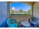 Relaxing patio seating area with views of the community landscape at 1240 S Missouri Ave # 415, Clearwater, FL 33756