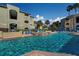 Stunning community pool with a shallow area and ample seating for residents at 1240 S Missouri Ave # 415, Clearwater, FL 33756
