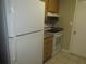 Kitchen showcasing appliances and ample counter space at 13289 Arbor Pointe Cir # 201, Tampa, FL 33617