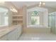 Bathroom with double vanity, soaking tub and walk-in shower at 1379 Matthew Ave, Spring Hill, FL 34609
