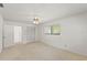 Bedroom features neutral walls, a closet, and a window at 1379 Matthew Ave, Spring Hill, FL 34609