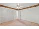 Bright bedroom featuring a ceiling fan, neutral walls, and closet at 1379 Matthew Ave, Spring Hill, FL 34609