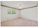 A bedroom featuring neutral walls and a window at 1379 Matthew Ave, Spring Hill, FL 34609