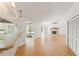 Open floor plan with eat-in kitchen and brick fireplace at 1379 Matthew Ave, Spring Hill, FL 34609
