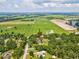 Discover this property from above in a scenic landscape of trees and open fields, and peaceful seclusion at 1414 Stephens Oak Ct, Plant City, FL 33567