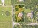 Property boundary aerial showcasing a home with mature trees, and generous outdoor space in a picturesque setting at 1414 Stephens Oak Ct, Plant City, FL 33567