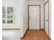 Bright foyer featuring hardwood floors and a view to the front yard at 1414 Stephens Oak Ct, Plant City, FL 33567