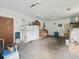 Spacious garage interior with wooden cabinets and abundant storage at 1414 Stephens Oak Ct, Plant City, FL 33567