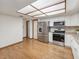 Open kitchen layout with stainless steel appliances, bright lighting, and plenty of storage at 1414 Stephens Oak Ct, Plant City, FL 33567