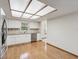 Bright kitchen with stainless steel appliances, white cabinets and stylish countertops at 1414 Stephens Oak Ct, Plant City, FL 33567