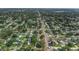 The house is centrally located within a neighborhood with tree-lined streets near the main thoroughfare at 1432 S Keene Rd, Clearwater, FL 33756