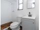 Simple bathroom featuring a new vanity and updated plumbing fixtures at 1432 S Keene Rd, Clearwater, FL 33756