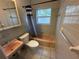 Full bathroom with retro tile and peach fixtures at 1542 Sherwood St, Clearwater, FL 33755