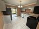 Well-equipped kitchen with stainless steel appliances and easy access to the patio at 1542 Sherwood St, Clearwater, FL 33755
