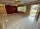 Spacious living room featuring tiled flooring and neutral paint colors at 1542 Sherwood St, Clearwater, FL 33755