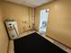 This utility room provides functionality with a modern water heater and adjacent access to other areas at 1542 Sherwood St, Clearwater, FL 33755