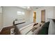 Main bedroom with wood floors, neutral tones, and natural light at 1615 Stonehaven Way, Tarpon Springs, FL 34689