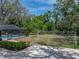 Expansive backyard featuring a screened-in pool area and soccer goal for outdoor fun at 17515 Drake Ct, Lutz, FL 33559