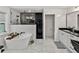 Modern bathroom with freestanding tub, glass-enclosed shower, and sleek fixtures at 17515 Drake Ct, Lutz, FL 33559