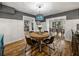 Elegant dining space featuring a round table, stylish lighting, and seamless flow to other areas at 17515 Drake Ct, Lutz, FL 33559