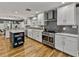 Well-equipped kitchen with stainless steel appliances, ample storage, and an island for seating and prep at 17515 Drake Ct, Lutz, FL 33559