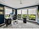 Stylish office with a large window view, modern desk, and elegant decor provides an ideal work environment at 17515 Drake Ct, Lutz, FL 33559