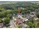 Aerial view showcasing the home's location in a lush, green neighborhood at 17815 Cranbrook Dr, Lutz, FL 33549