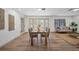 Bright living and dining area with modern decor and large windows, lots of natural light at 17815 Cranbrook Dr, Lutz, FL 33549