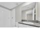 Bright bathroom featuring white tiled shower and granite vanity at 1873 Colding Dr, Ruskin, FL 33570