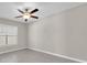 Empty neutral bedroom with tile floor and ceiling fan at 1873 Colding Dr, Ruskin, FL 33570