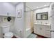 Clean, well-lit bathroom with white vanity, tiled shower/tub, and modern fixtures at 2411 W Horatio St # 526, Tampa, FL 33609