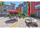 Outdoor picnic area featuring tables, chairs, and a grill for resident use, enhancing community living at 2411 W Horatio St # 526, Tampa, FL 33609