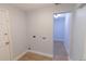 This laundry room features hookups for a washer and dryer and access to another room at 2505 Buckhorn Run Dr, Valrico, FL 33596