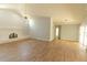 Spacious living room featuring wood floors, a white brick fireplace and recessed lighting at 2505 Buckhorn Run Dr, Valrico, FL 33596