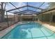 Relaxing screened-in pool with adjacent hot tub and deck, perfect for outdoor entertaining at 2505 Buckhorn Run Dr, Valrico, FL 33596