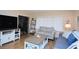 Inviting living room with comfortable seating, offering a relaxing space for entertaining and enjoying quiet moments at 2593 Countryside Blvd # 7204, Clearwater, FL 33761