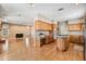 Bright open-concept living area with wood floors, fireplace, and spacious layout at 2704 Chambray Ln, Tampa, FL 33611