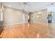 Open-concept living room features hardwood floors, recessed lighting and lots of open space at 2704 Chambray Ln, Tampa, FL 33611