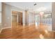 Open living area features hardwood floors and flows seamlessly into other living spaces at 2704 Chambray Ln, Tampa, FL 33611