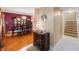 The dining room features a chandelier, china cabinet and staircase to the right at 2718 W Leila Ave, Tampa, FL 33611