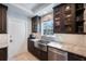 Bright kitchen featuring stainless steel appliances, granite countertops and modern cabinets at 2718 W Leila Ave, Tampa, FL 33611