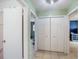 Hallway with closet, seamlessly connecting different areas of the home at 2720 Wiltshire Ave, Palm Harbor, FL 34685