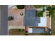 Aerial view of landscaped property showing brick patio, mature trees, and custom fountain at 2805 W Patterson St, Tampa, FL 33614